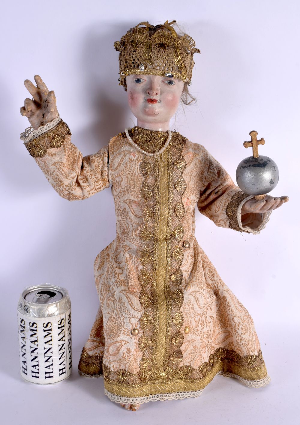 A VERY RARE 17TH/18TH CENTURY EUROPEAN CARVED AND PAINTED WOODEN DOLL modelled with one hand raised,