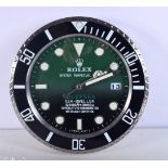 A ROLEX SHOP DISPLAY ADVERTISING WALL CLOCK. 33 cm diameter.