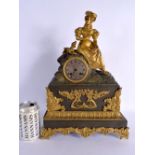A 19TH CENTURY FRENCH GILT AND PATINATED BRONZE MANTEL CLOCK formed with a female and hound. 40 cm x