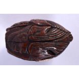 A FINE AND RARE 18TH CENTURY EUROPEAN CARVED COQUILLA NUT BOX AND COVER decorated in relief all over
