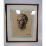 A framed charcoal of a male by Juliet Pannett dated 1962 40 x 29 cm.