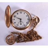 A GOLD FILLED POCKET WATCH BY DENNISON WITH CHAIN. Dial 5cm, Weight 125g total