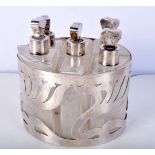AN ART NOUVEAU CONTINENTAL SILVER MOUNTED SCENT BOTTLES. Weighable silver 183 grams. 14 cm x 12 cm.