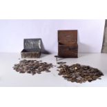 A collection of mostly pre decimal coins together with a wooden offertory box and a tin. (Qty)