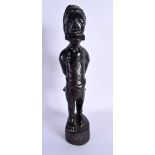 A RARE AFRICAN CARVED TRIBAL SLAVE FIGURE. 34 cm high.
