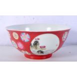 A Chinese porcelain polychrome bowl decorated with flower heads 7 x 15.5cm.