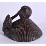 A JAPANESE WOOD NETSUKE CARVED AS A FROG ON A COOLIE HAT. 3.6cm x 4.3cm x 5.3cm, weight 20g