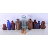 A collection of antique glass medicine bottles, chemist bottles and stone wear pots 14cm (10)