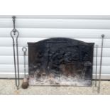 A Victorian cast iron fire back together with fire side tools 48 x 63 Fire back.(5)