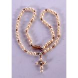 A 9CT GOLD MOUNTED PEARL NECKLACE. Length 39cm, Bead size 4.9mm, weight 16.4g