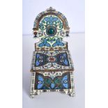 AN UNUSUAL CONTINENTAL SILVER AND ENAMEL SPICE BOX inset with a gem stone, decorated with motifs and