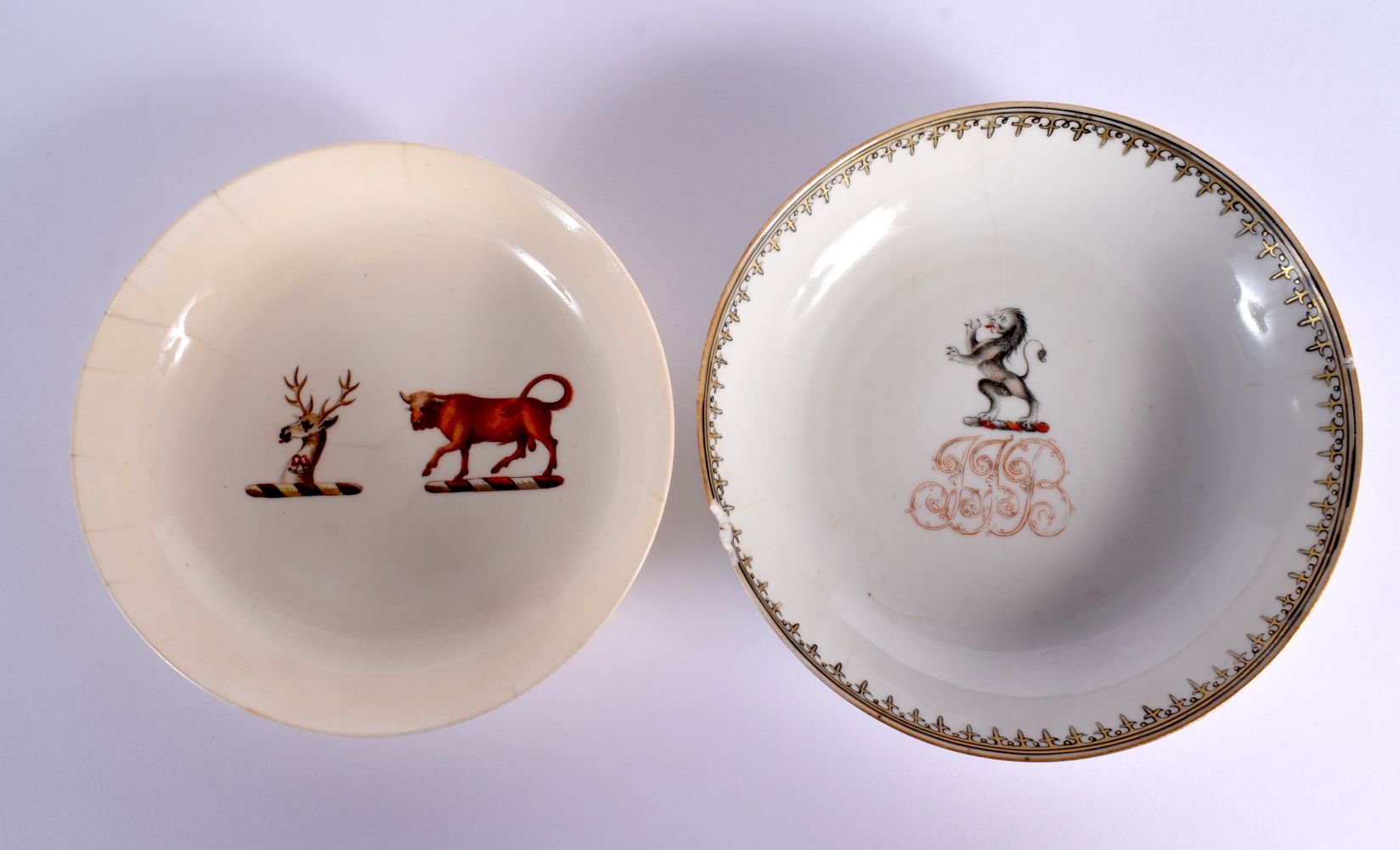 A RARE EARLY 19TH CENTURY DAVENPORT LONGPORT ARMORIAL SAUCER and a Chinese Qianlong saucer. Largest