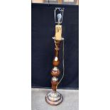 A Mid Century wooden and brass lampstand 144cm.