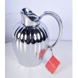 A GEORG JENSEN SILVER PLATED WATER JUG. 24 cm high.