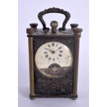 AN ANTIQUE MINIATURE CARRIAGE CLOCK. 11 cm x 6 cm inc handle.