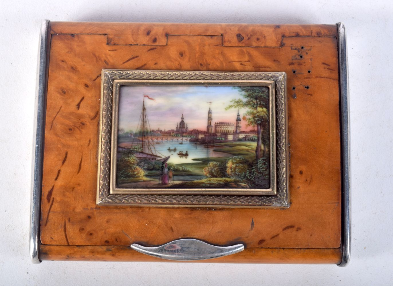 A RARE 19TH CENTURY RUSSIAN SILVER PORCELAIN AND WOOD BOX painted with a lake scene. 63 grams. 9 cm