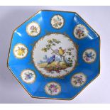 18TH CENTURY SEVRES OCTAGONAL DISH PAINTED WITH BIRDS IN LANDSCAPE SURROUNDED BY EIGHT CIRCULAR GILT