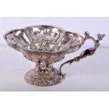 AN EROTIC SILVER DRINKING VESSEL WITH CLASSICAL FEATURES. Indistinguishable mark, 8.8cm x 17.3cm x 1