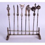 A SET OF EIGHT CHINESE EXPORT SILVER SKEWERS. 14 cm x 12 cm.