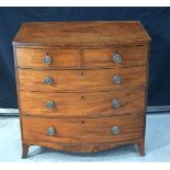 A 19th Century bow fronted mahogany chest of drawers 85 x 85 x 55 cm.