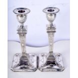 A PAIR OF ANTIQUE NEO CLASSICAL SILVER CANDLESTICKS. 597 grams overall. London 1898. 20 cm x 9.5 cm.