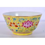 A small Chinese porcelain yellow ground tea bowl decorated with foliage. 5 x 9.5cm.
