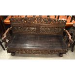 A RARE LARGE 19TH CENTURY CHINESE HONGMU HARDWOOD BENCH Qing, decorated with dragons. 148 cm x 82 cm
