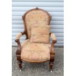A Victorian walnut salon armchair C1870 94 x 69 x 85 cm.