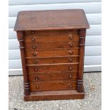 A small 8 drawer wellington chest 64 x 49 x30 cm.