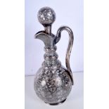 AN ANTIQUE SILVER OVERLAID CLARET JUG AND STOPPER. 1887 grams overall. 32 cm x 14 cm.