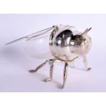 A HONEY POT IN THE FORM OF A BEE WITH GLASS BOWL AND PLATED BODY. 9cm x 14.5cm x 9.6cm