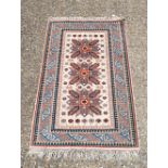 A Kazak style rug 161 x 100 cm.