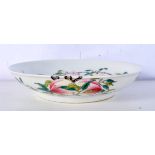 A Chinese porcelain dish decorated with peaches and bats 5 x 21cm.