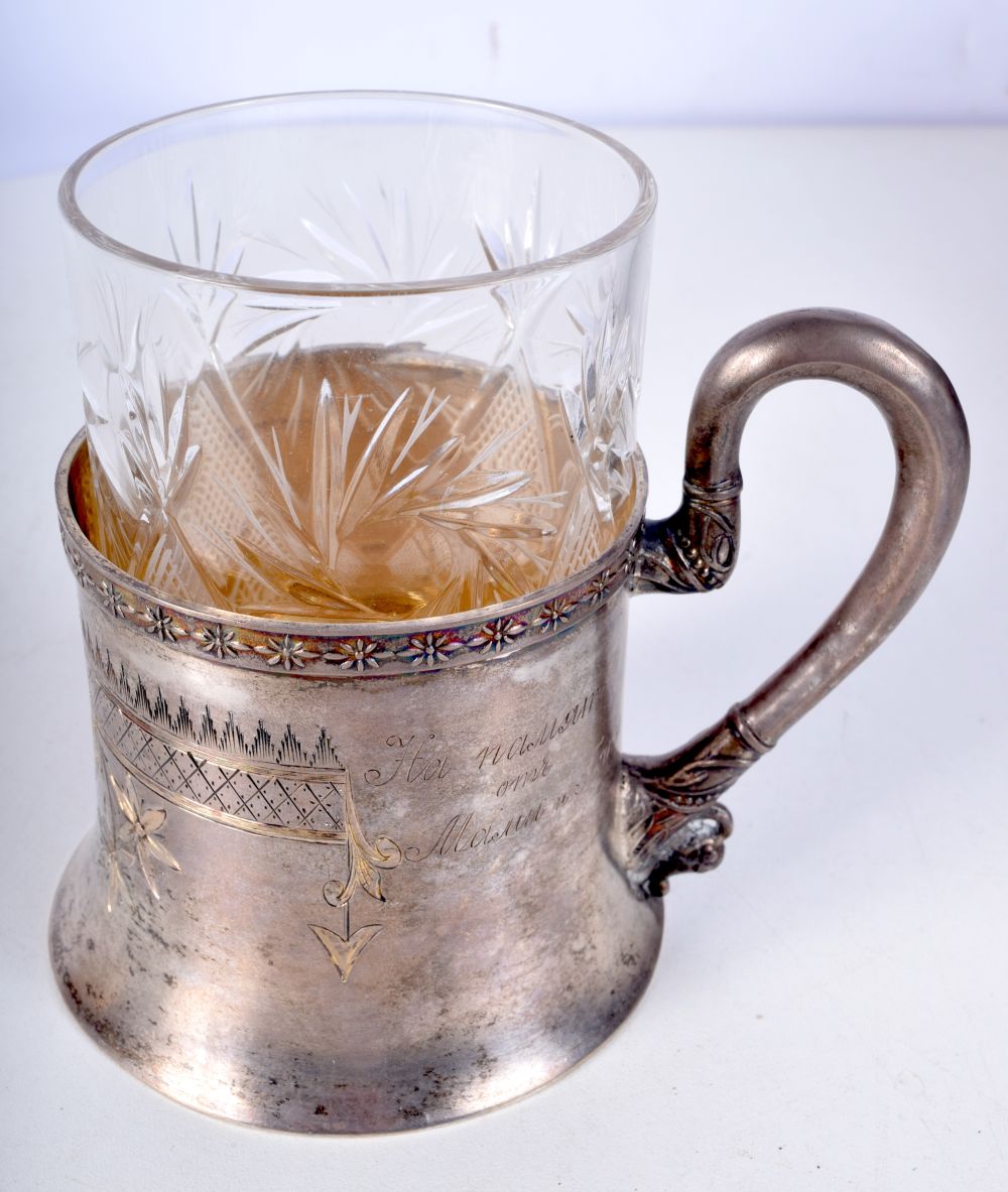 AN ANTIQUE RUSSIAN SILVER AND GLASS CUP HOLDER. Silver 191 grams. 11 cm x 9 cm.