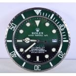 A ROLEX SHOP DISPLAY ADVERTISING WALL CLOCK. 33 cm diameter.