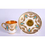 LATE 19TH/EARLY 20TH CENTURY COALPORT DEMI TASSE COFFEE CUP AND SAUCER WITH RAISED GILT AND TURQUOIS