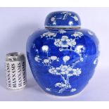 A LARGE CHINESE QING DYNASTY BLUE AND WHITE PORCELAIN GINGER JAR AND COVER Kangxi style. 26 cm x 15