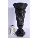 A RARE 19TH CENTURY EUROPEAN CARVED COAL MASONIC TYPE VASE decorated all over with motifs. 35 cm x 1