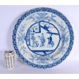 A VERY LARGE EARLY 18TH CENTURY CHINESE BLUE AND WHITE PORCELAIN CHARGER Yongzheng, painted with thr