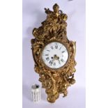 A LARGE 19TH CENTURY FRENCH GILT BRONZE HANGING CARTEL CLOCK decorated with figures in various pursu