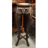 A 19TH CENTURY CHINESE CARVED HARDWOOD MARBLE INSET STAND. 92 cm x 24 cm.