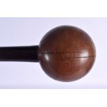 AN AFRICAN CARVED HARDWOOD KNOBKERRIE THROWING CLUB. 70 cm long.