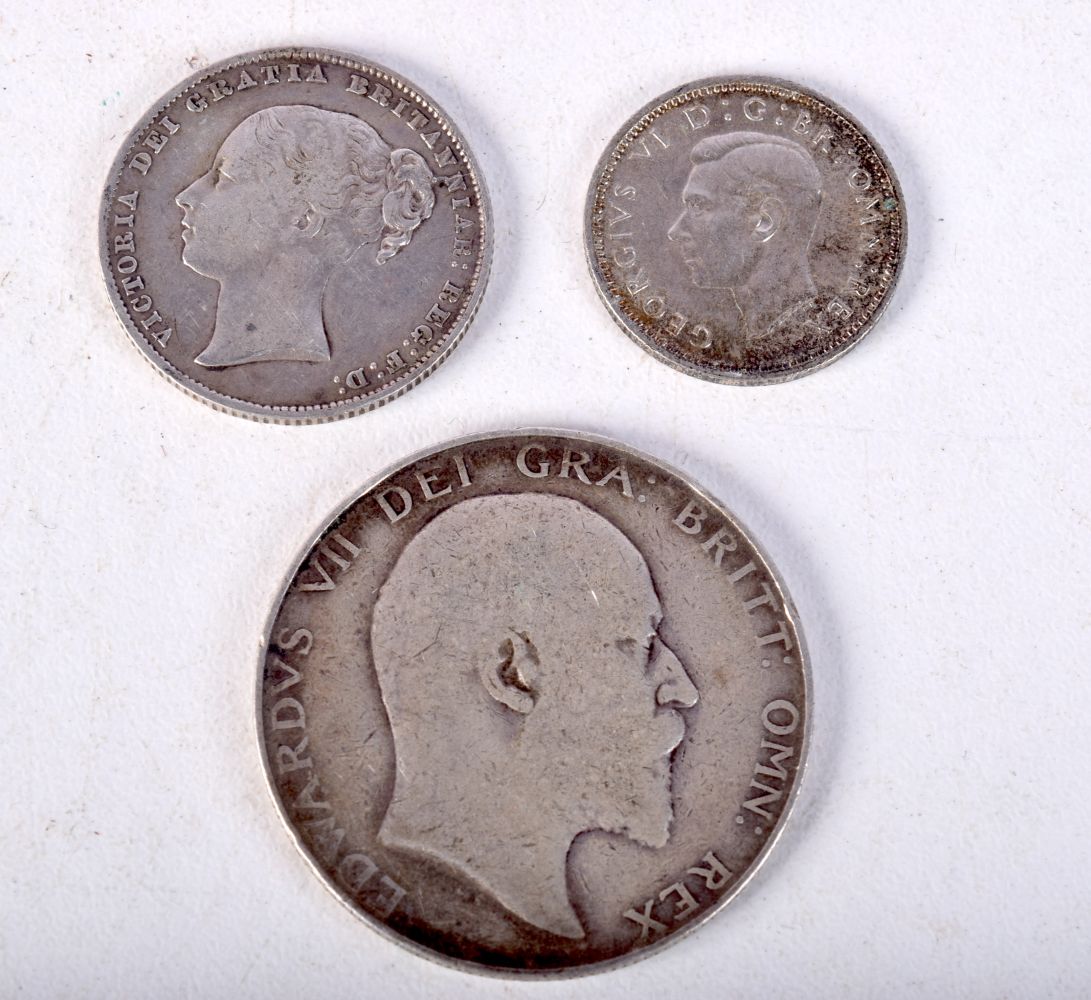 THREE SILVER COINS. 22.4 grams. (3)