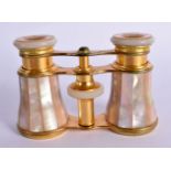 A PAIR MOF MOTHER OF PEARL OPERA GLASSES. 6.7cm x 10.3cm