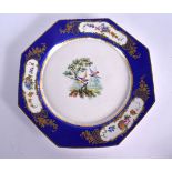 18TH CENTURY SEVRES PLATE PAINTED WITH BIRDS, PROBABLY BY ALONCLE, IN LANDSCAPE UNDER A BLUE BORDE