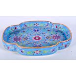 A small Chinese porcelain blue ground dish decorated with a floral pattern and gilded rim 2.5 x 15.5
