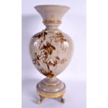 A LARGE VICTORIAN ENAMELLED PALE BROWN GLAZED OPALINE VASE painted with flowers. 35 cm x 15 cm.