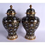 A PAIR OF EARLY 20TH CENTURY CHINESE CLOISONNE ENAMEL VASES AND COVERS Late Qing/Republic. 30 cm hig