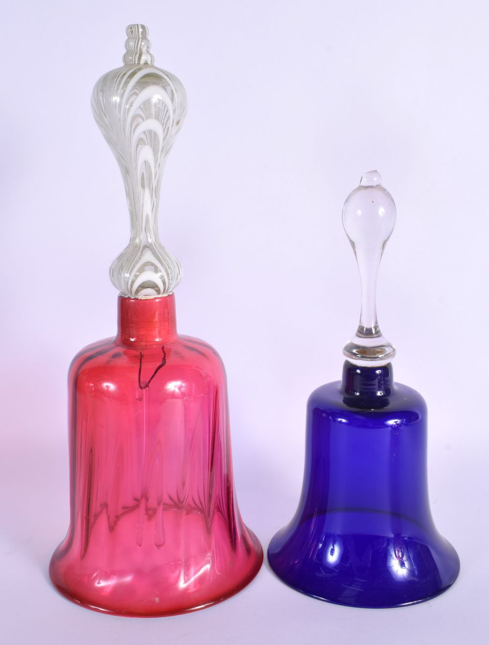 A PAIR OF BOHEMIAN BLUE FLASH DECANTERS with stoppers, together with a vase & bells. Largest 34 cm h - Bild 4 aus 7