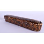 A 19TH CENTURY MIDDLE EASTERN CARVED PAPER MACHE LACQUERED QAJAR SLIDING PEN BOX painted with figure